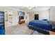 Main bedroom with king bed and en-suite bathroom at 194 Argyll Dr, Spring Hill, FL 34609
