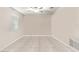 Spacious bonus room with window, tile floors, and ceiling fan at 194 Argyll Dr, Spring Hill, FL 34609