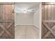 Empty bonus room with tile floors and ceiling fan at 194 Argyll Dr, Spring Hill, FL 34609