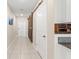 Hallway with tile floors and barn door at 194 Argyll Dr, Spring Hill, FL 34609
