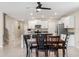 Bright kitchen with island, stainless steel appliances, and dining area at 194 Argyll Dr, Spring Hill, FL 34609