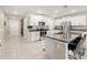 Spacious kitchen with an island and stainless steel appliances at 194 Argyll Dr, Spring Hill, FL 34609