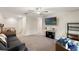 Upstairs living area with TV and gray sofa at 194 Argyll Dr, Spring Hill, FL 34609