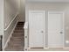 Upstairs hallway with access to bedrooms and bathrooms at 194 Argyll Dr, Spring Hill, FL 34609