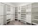 Large walk-in closet with ample shelving and hanging space at 194 Argyll Dr, Spring Hill, FL 34609
