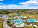 Resort-style pool, lap pool, playground, and community center at 20200 Lace Cascade Rd, Land O Lakes, FL 34637
