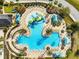 Aerial view of community pool and surrounding amenities at 20200 Lace Cascade Rd, Land O Lakes, FL 34637