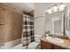 Bathroom with shower/tub and granite vanity at 20200 Lace Cascade Rd, Land O Lakes, FL 34637