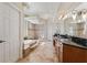 Large bathroom with double vanity, soaking tub, and shower at 20200 Lace Cascade Rd, Land O Lakes, FL 34637