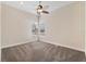Spacious bedroom with neutral decor and two windows at 20200 Lace Cascade Rd, Land O Lakes, FL 34637