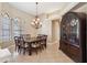 Formal dining room with chandelier and hardwood floors at 20200 Lace Cascade Rd, Land O Lakes, FL 34637