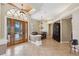 Bright and spacious entryway with elegant chandelier and hardwood floors at 20200 Lace Cascade Rd, Land O Lakes, FL 34637