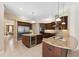 Spacious kitchen boasts an island, granite counters, and stainless steel appliances at 20200 Lace Cascade Rd, Land O Lakes, FL 34637