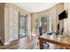 Home office with granite desk and wood floors at 20200 Lace Cascade Rd, Land O Lakes, FL 34637