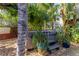 Hot tub surrounded by tropical plants in a backyard oasis at 3308 Oleander Dr, Hernando Beach, FL 34607