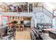 Open kitchen with breakfast bar and living area at 3308 Oleander Dr, Hernando Beach, FL 34607