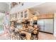 Eat-in kitchen with granite countertops and wood cabinets at 3308 Oleander Dr, Hernando Beach, FL 34607