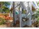 Convenient outdoor shower area with charming decor, perfect for rinsing off after a swim at 3308 Oleander Dr, Hernando Beach, FL 34607