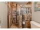 Walk-in shower with multiple shower heads and tile surround at 3308 Oleander Dr, Hernando Beach, FL 34607