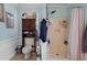 Clean bathroom with shower, toilet and cabinet at 3497 Chadwick Ave, Spring Hill, FL 34609
