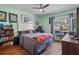 Bedroom with a queen bed and window view at 3497 Chadwick Ave, Spring Hill, FL 34609