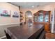 Elegant dining room featuring a large table and a stunning hutch at 3497 Chadwick Ave, Spring Hill, FL 34609