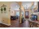 Inviting entryway with hardwood floors and views into the dining area at 3497 Chadwick Ave, Spring Hill, FL 34609