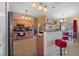 Kitchen with island, granite countertops, and stainless steel appliances at 3497 Chadwick Ave, Spring Hill, FL 34609