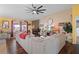 Living room with sectional sofa, fireplace and large TV at 3497 Chadwick Ave, Spring Hill, FL 34609