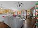 Living room with sectional sofa, fireplace and kitchen views at 3497 Chadwick Ave, Spring Hill, FL 34609