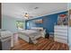 Spacious main bedroom with large window and ample closet space at 3497 Chadwick Ave, Spring Hill, FL 34609