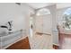 Bright entryway with tile flooring and double doors at 3912 Rudder Way, New Port Richey, FL 34652