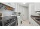 Laundry room with washer, dryer, and built-in cabinets at 3912 Rudder Way, New Port Richey, FL 34652