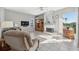 Relaxing living room with fireplace and built-in shelving at 3912 Rudder Way, New Port Richey, FL 34652