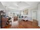 Living room with hardwood floors, sliding doors to lanai at 3912 Rudder Way, New Port Richey, FL 34652