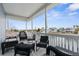 Relaxing covered balcony with comfortable seating and beautiful water views at 4045 Centavo Ct, Hernando Beach, FL 34607