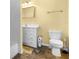 Bright bathroom with neutral color palette and decorative mirror at 4045 Centavo Ct, Hernando Beach, FL 34607