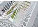 Elevated view of a white wooden stairway leading down to a dockside residence at 4045 Centavo Ct, Hernando Beach, FL 34607