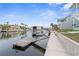 Scenic waterfront view with private dock and canal access, ideal for boating enthusiasts at 4045 Centavo Ct, Hernando Beach, FL 34607