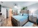 Spacious bedroom with large bed, dresser, and plenty of natural light at 4061 Montano Ave, Spring Hill, FL 34609