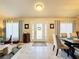Inviting front entry with a decorative door and tile flooring at 4061 Montano Ave, Spring Hill, FL 34609