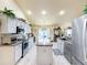 Spacious kitchen with an island and plenty of cabinet space at 4061 Montano Ave, Spring Hill, FL 34609