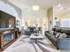 Open living room showcasing a decorative wall and comfy sofas at 4061 Montano Ave, Spring Hill, FL 34609