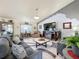 Spacious living room featuring a fireplace and ample seating at 4061 Montano Ave, Spring Hill, FL 34609