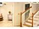 Elegant staircase with wooden banister leading to the upper level at 4230 Arborwood Ln, Tampa, FL 33618