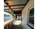 Covered patio bar with wood countertop and lighting at 4292 Maple Ne St, St Petersburg, FL 33703