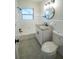 Updated bathroom with granite vanity and new fixtures at 4292 Maple Ne St, St Petersburg, FL 33703