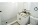 Clean and modern bathroom with white subway tile shower and granite countertop at 4292 Maple Ne St, St Petersburg, FL 33703