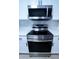 Stainless steel built-in microwave and range at 4292 Maple Ne St, St Petersburg, FL 33703