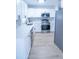 Modern kitchen featuring stainless steel appliances and white shaker cabinets at 4292 Maple Ne St, St Petersburg, FL 33703